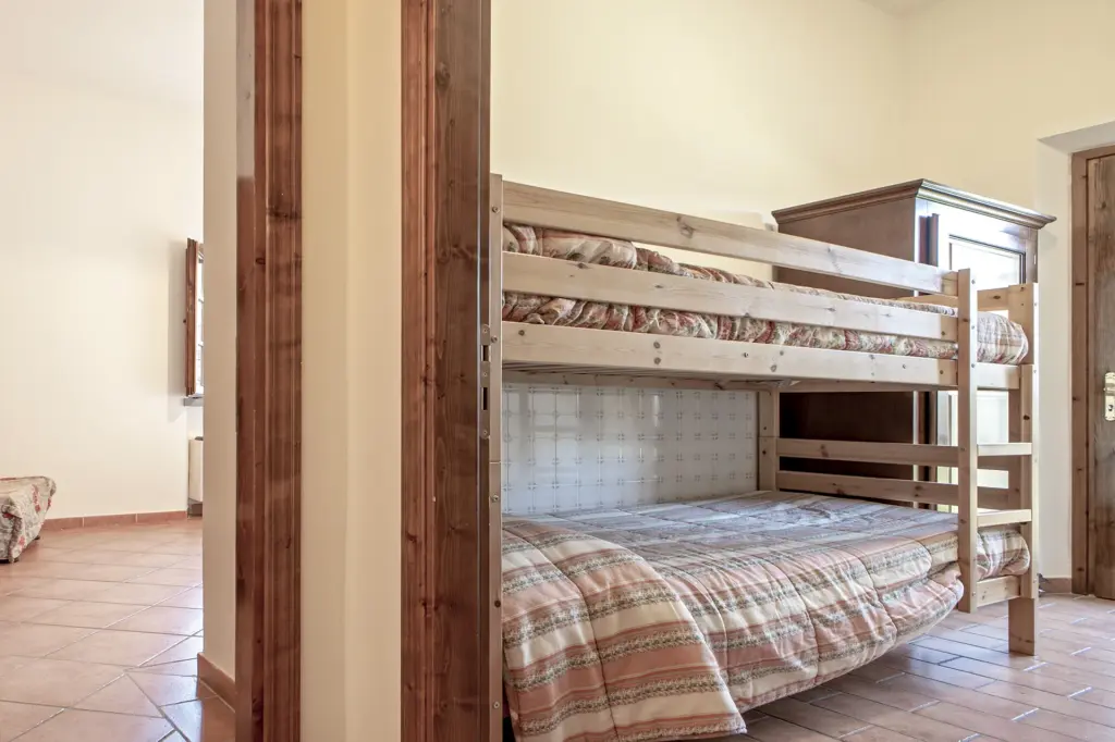 Camera con letto a castello della Suite 12 Family